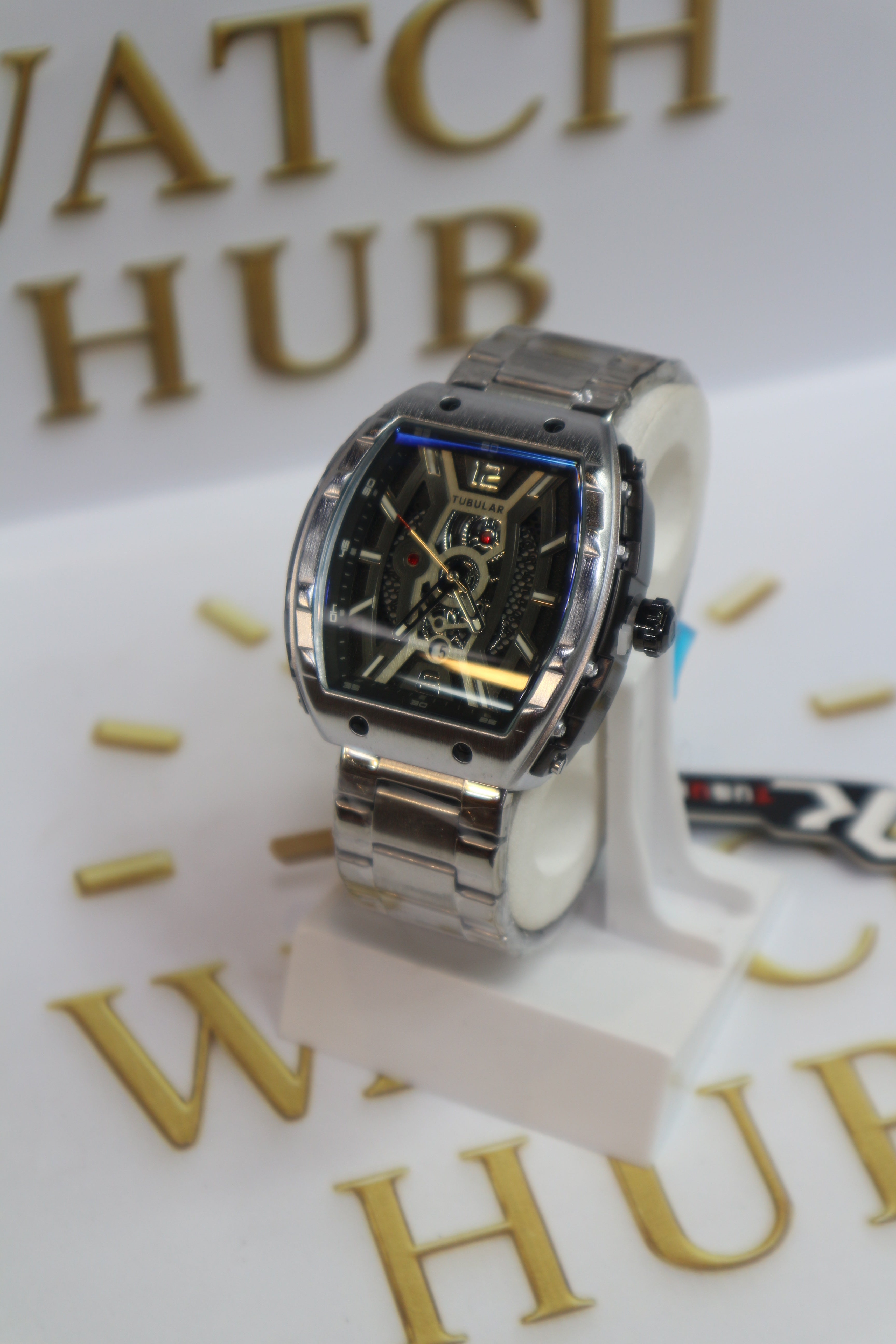 Tubular Model: Looks like a Skeleton Dial Analog Watch