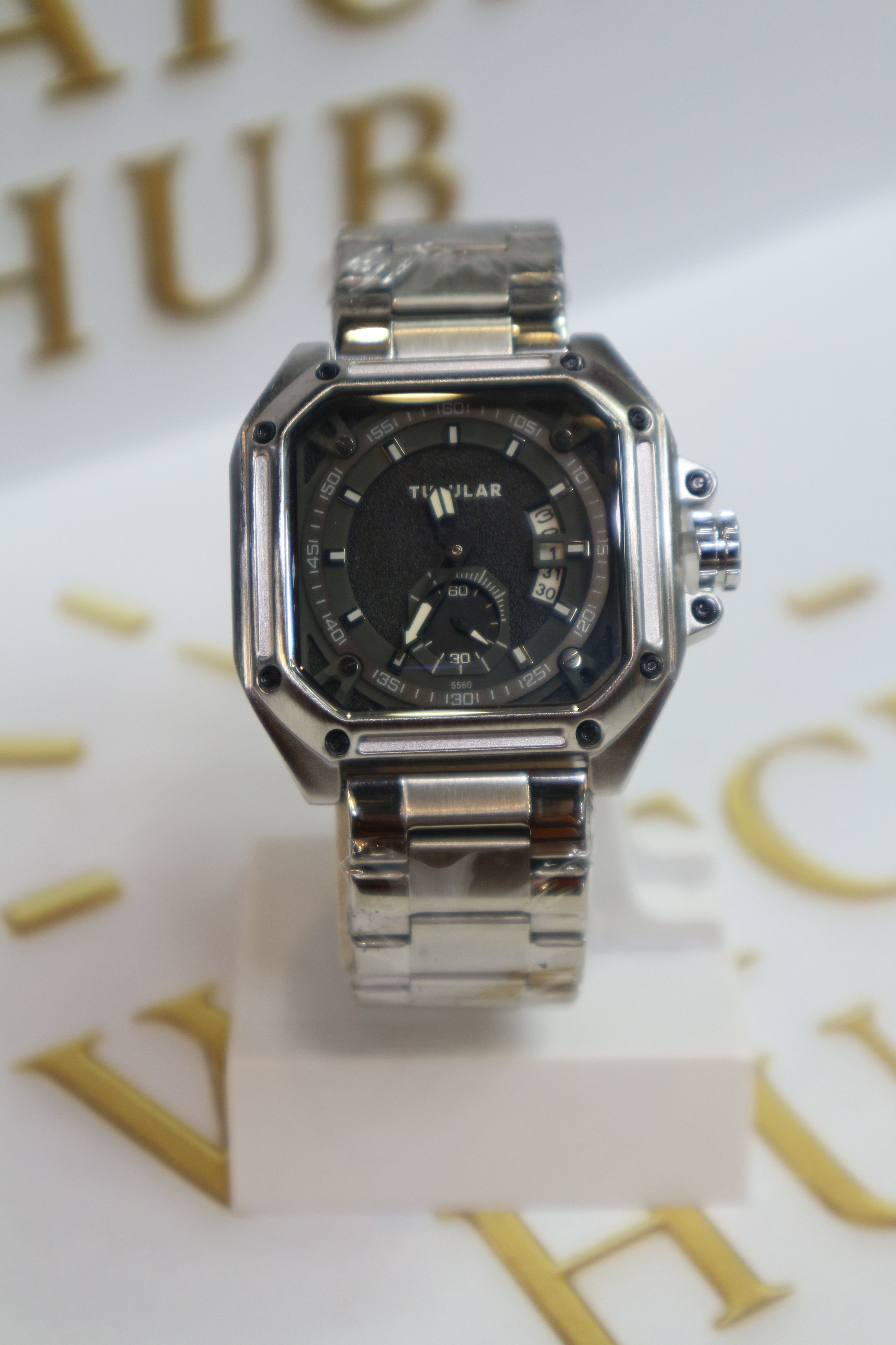 TUBULAR Appears to be Model Matte Black Textured Center with Glossy Silver Hour Markers
