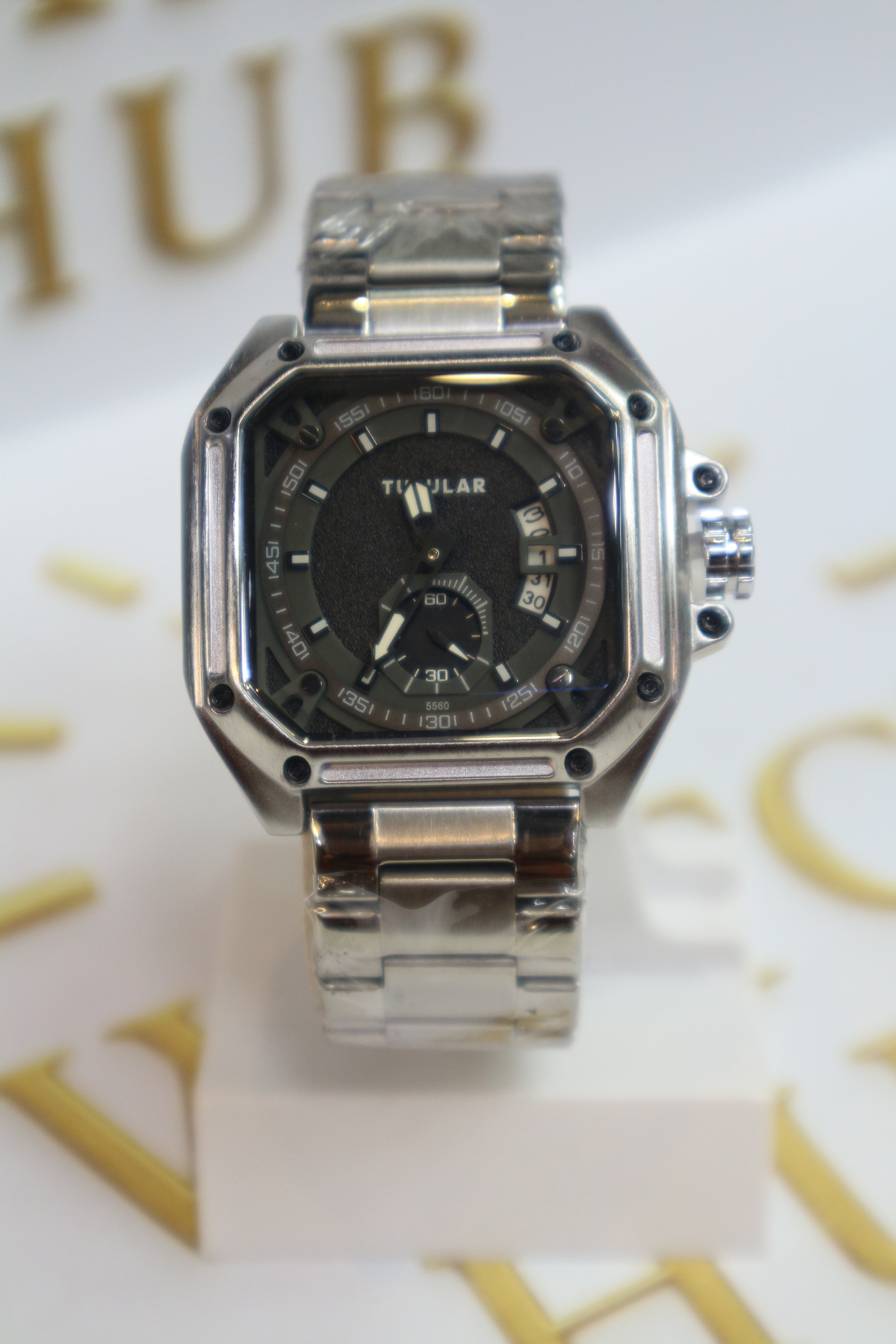 TUBULAR Appears to be Model Matte Black Textured Center with Glossy Silver Hour Markers
