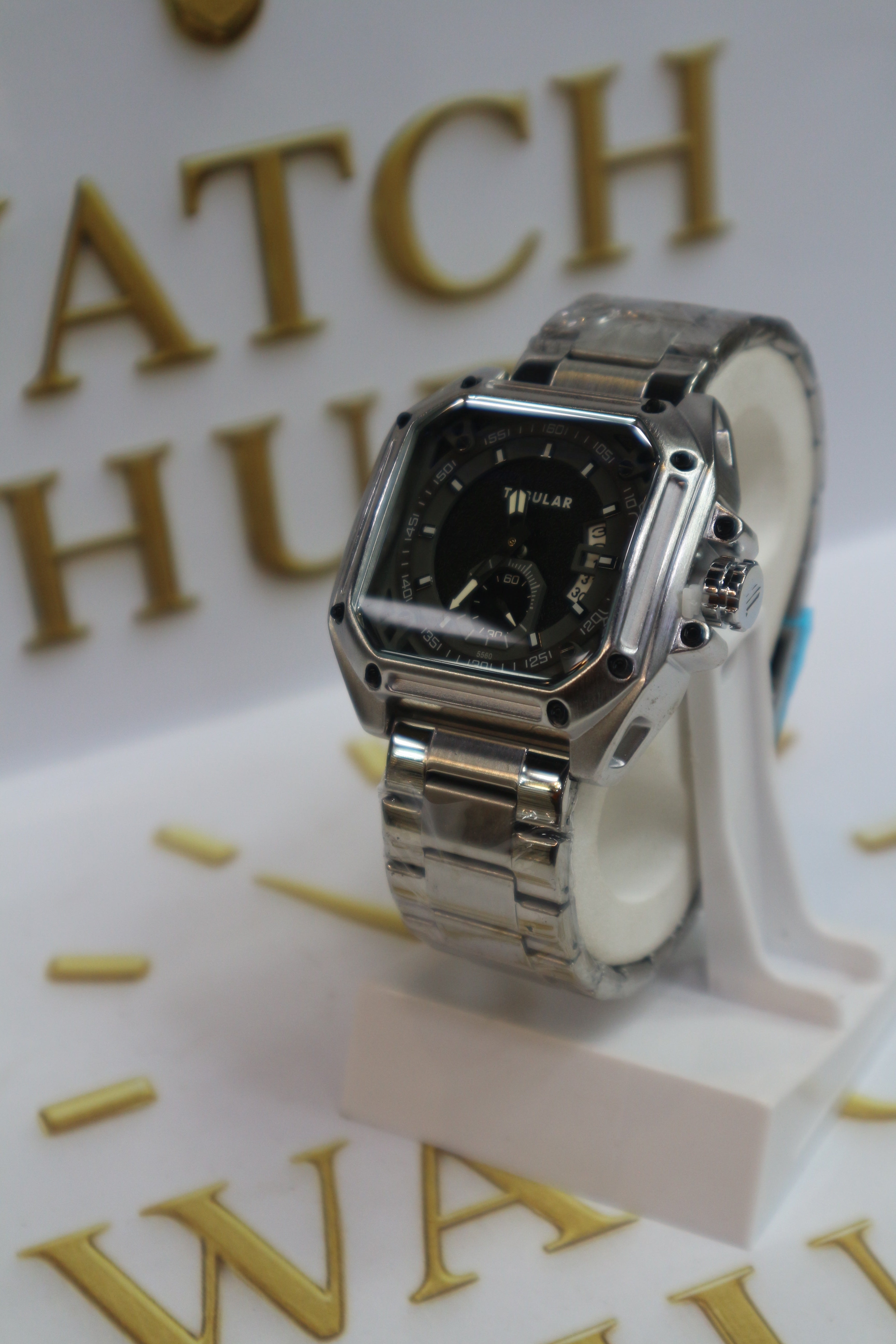 TUBULAR Appears to be Model Matte Black Textured Center with Glossy Silver Hour Markers
