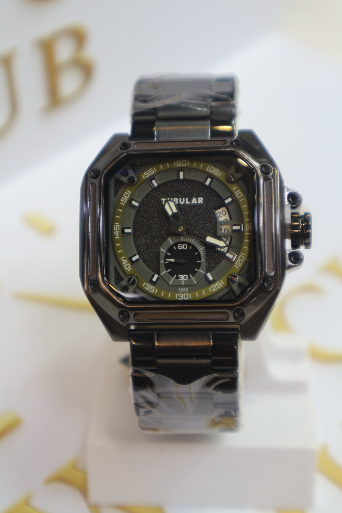 Appears to be Model BLACK FINISH Textured Center with Glossy BLACK Hour Markers