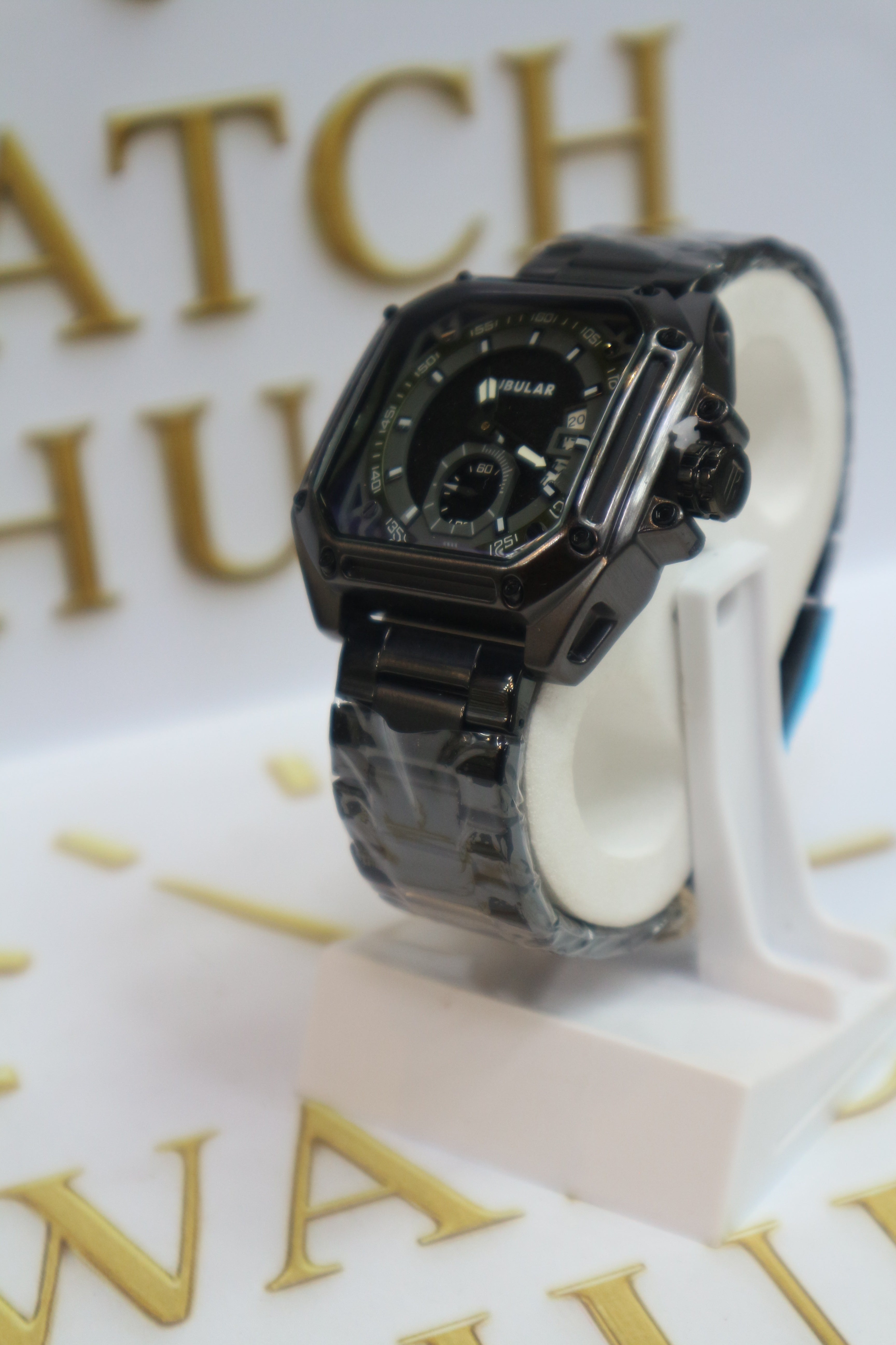Appears to be Model BLACK FINISH Textured Center with Glossy BLACK Hour Markers