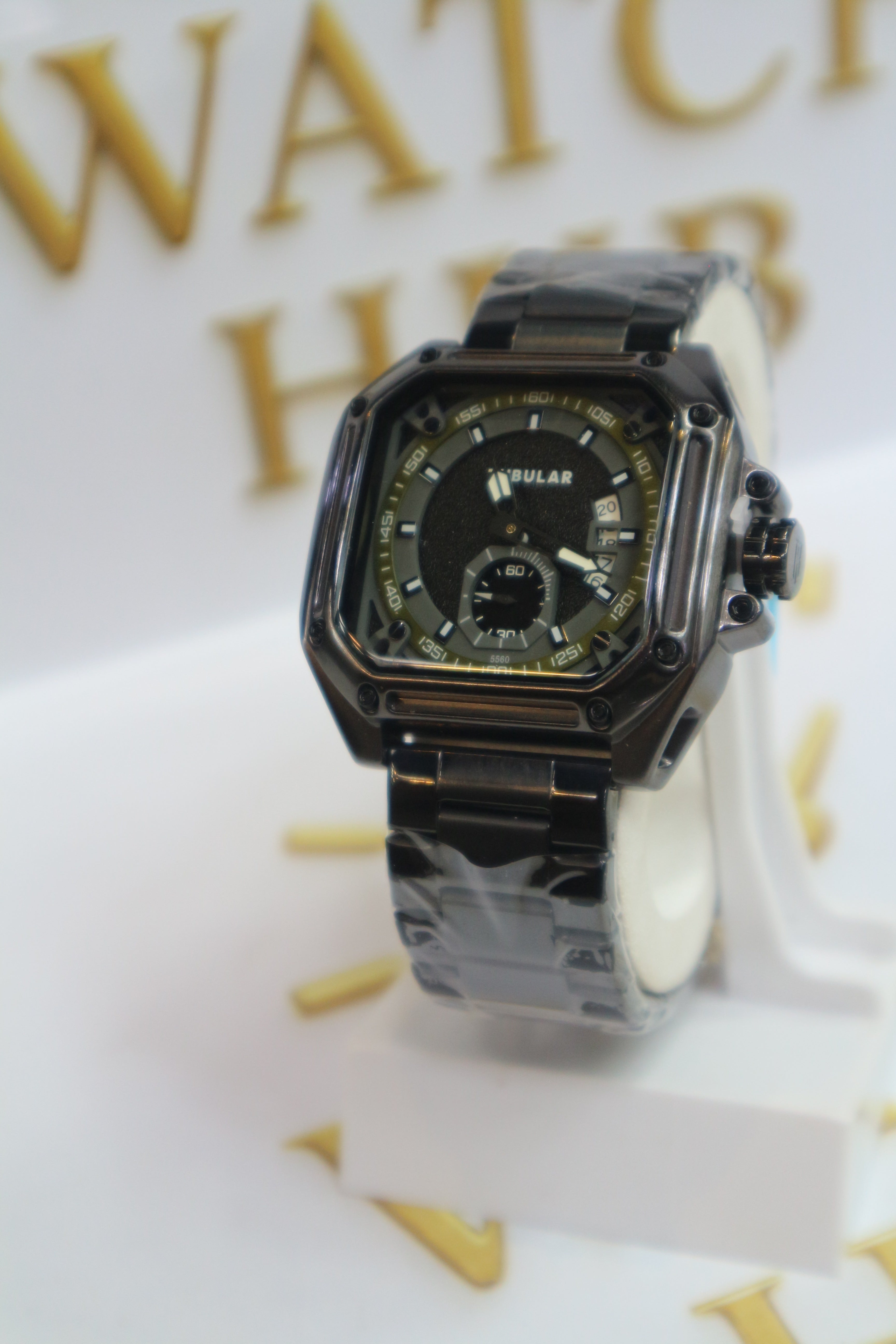 Appears to be Model BLACK FINISH Textured Center with Glossy BLACK Hour Markers