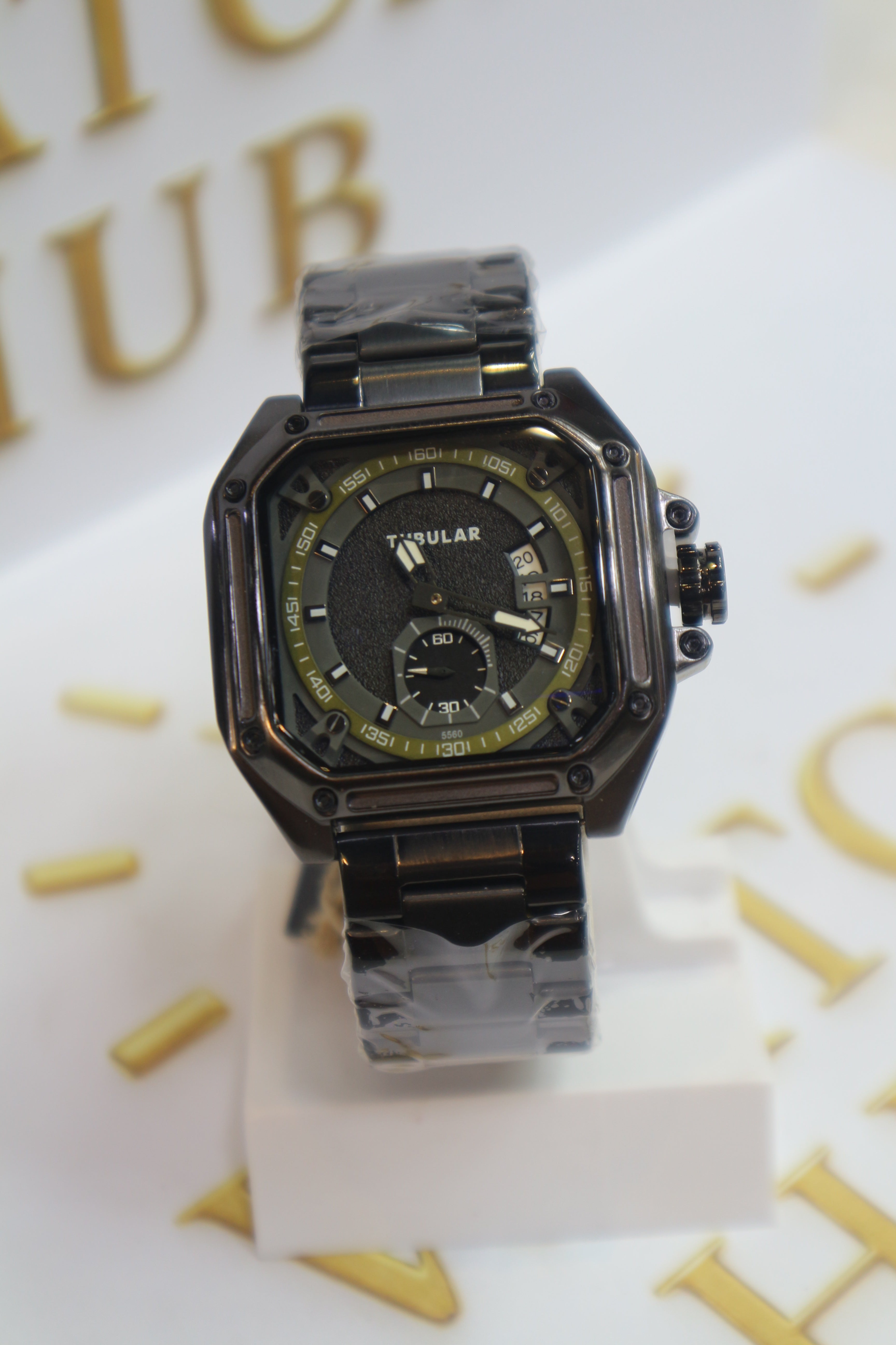Appears to be Model BLACK FINISH Textured Center with Glossy BLACK Hour Markers